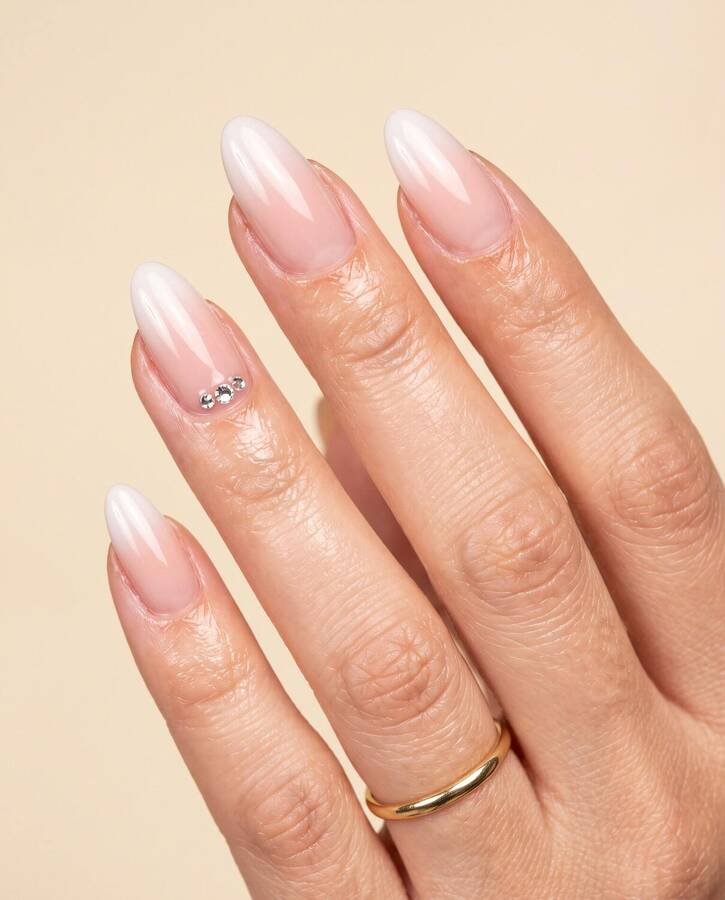 Almond nails in a blush to milk ombre
